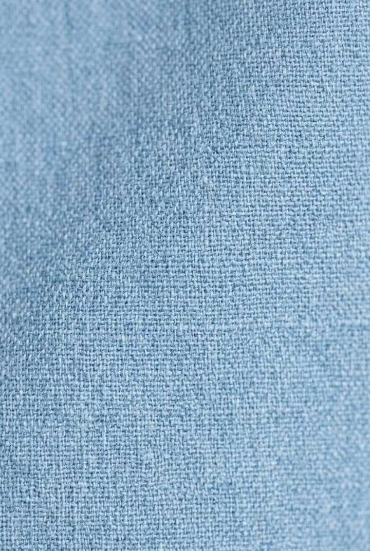 Men's stylish long-sleeve chambray shirt, relaxed fit, for smart casual occasions.