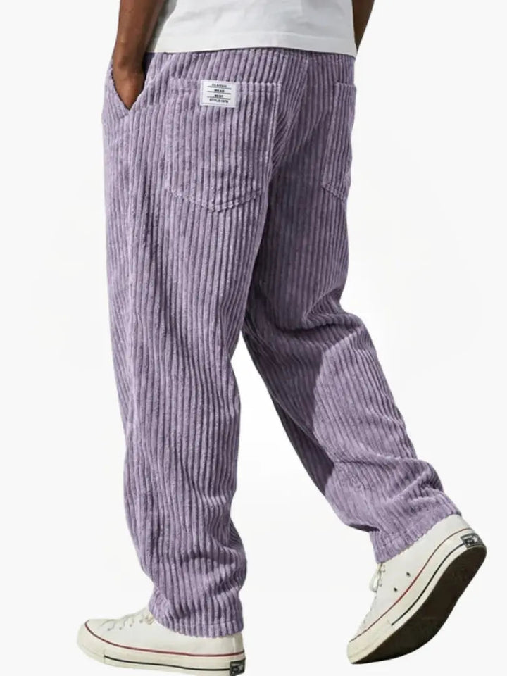 Men's comfortable relaxed corduroy trousers, featuring a functional drawstring waist, ideal for versatile styling.