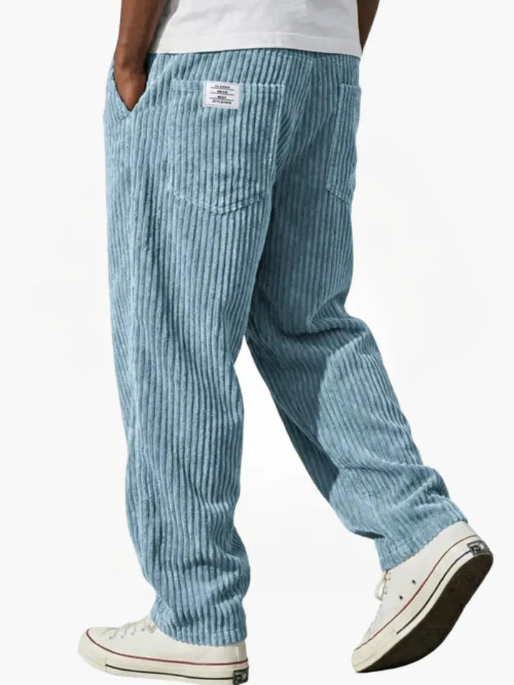 Casual men's corduroy drawstring trousers in a relaxed fit, designed for all-day comfort and versatile wear.