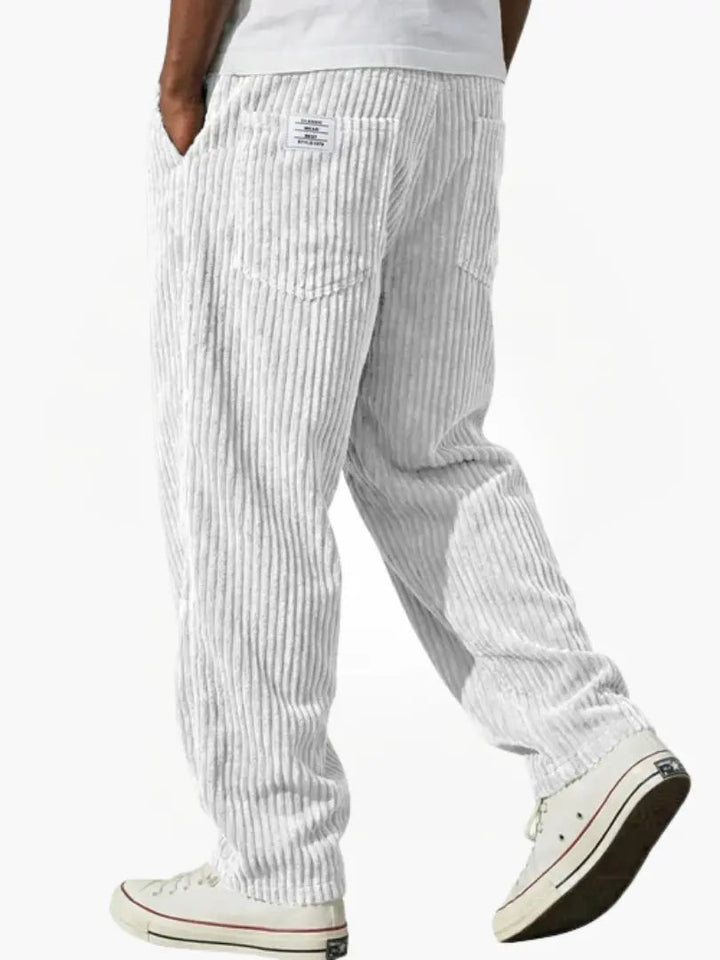Fashionable men's drawstring corduroy pants with a relaxed silhouette, great for comfortable everyday style.