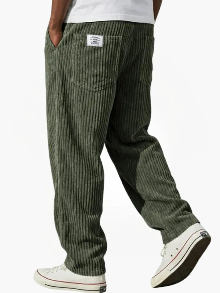 Front view of relaxed men's corduroy pants with adjustable drawstring, suitable for casual and comfortable outfits.