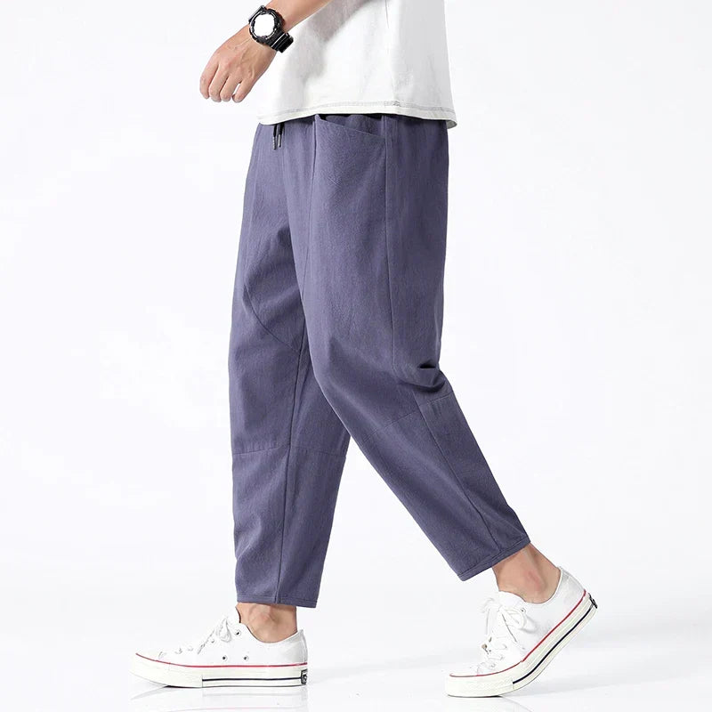 Men's relaxed fit cropped drawstring trousers for lightweight summer wear. Casual & comfortable apparel.