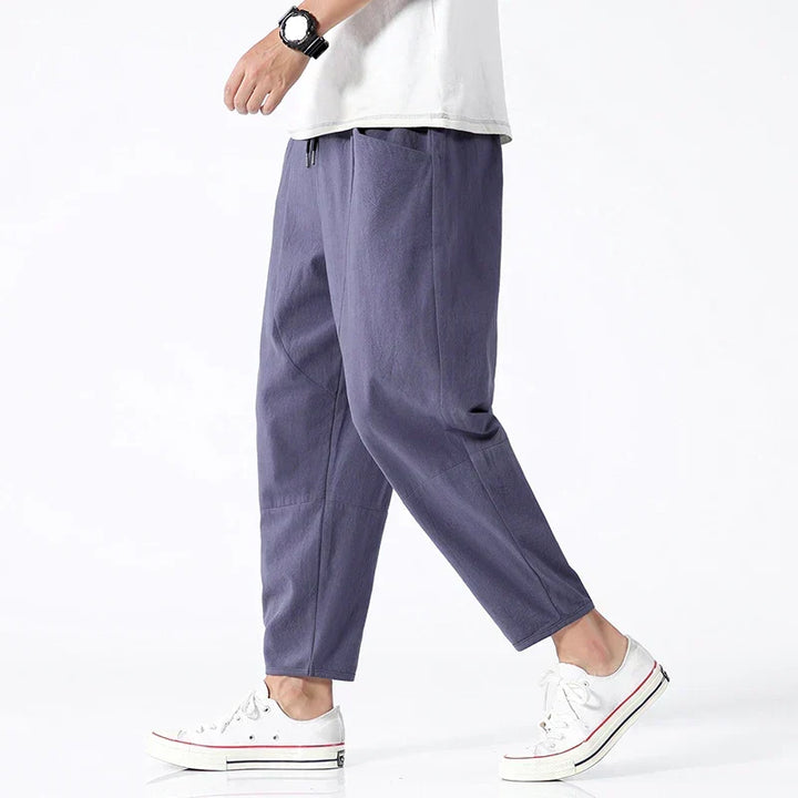 Men's relaxed fit cropped drawstring trousers for lightweight summer wear. Casual & comfortable apparel.