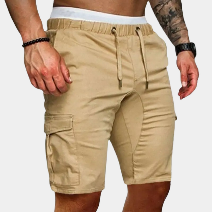 Stylish men's khaki relaxed fit utility drawstring cargo shorts, ideal for everyday casual summer fashion.