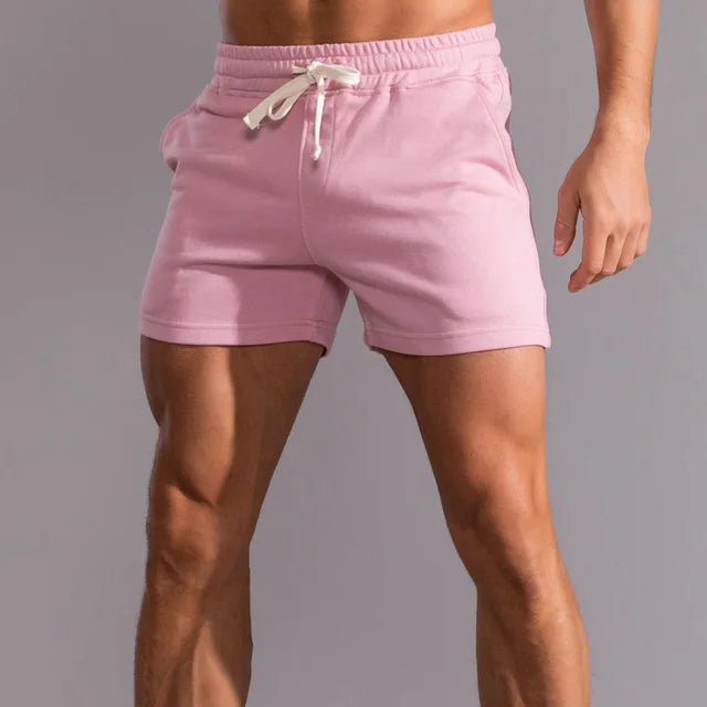 Comfortable men's relaxed fit jogger shorts with adjustable drawstring waist, perfect for athletic & casual summer wear.
