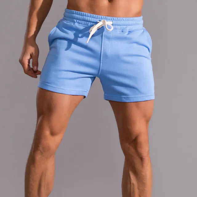 Back view of men's relaxed fit jogger shorts, showcasing comfortable design, relaxed fit, and utility pocket detail.