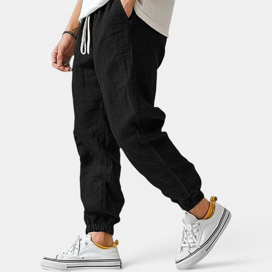 Casual mens drawstring pants. Relaxed fit, breathable fabric for summer, lounge wear, or travel.