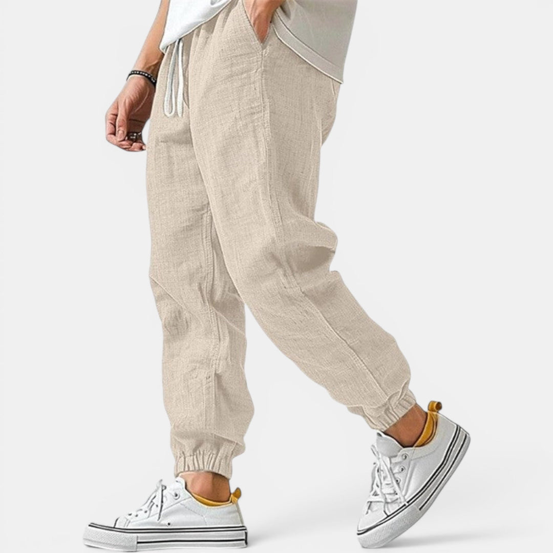 Modern menswear: comfortable relaxed fit drawstring pants. Ideal for everyday style and smart casual looks.