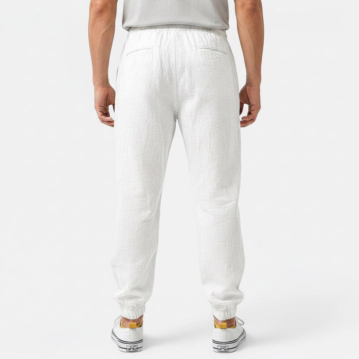 Smart casual mens drawstring pants. Relaxed fit, breathable and tapered for modern, comfortable wear.