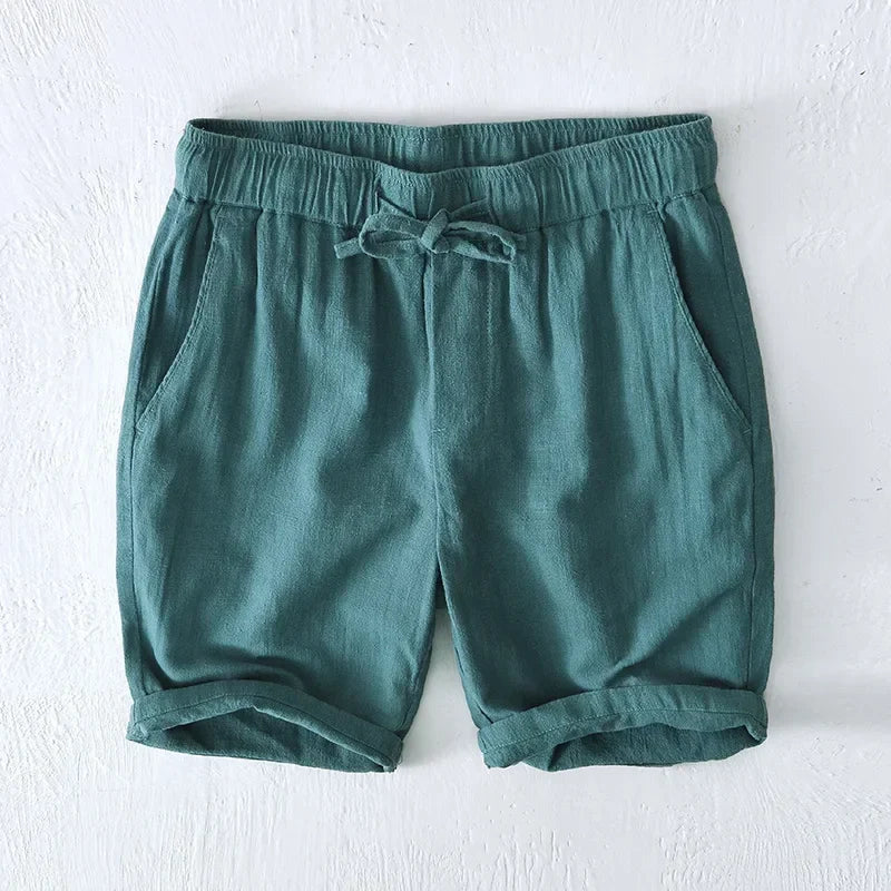 Stylish men's relaxed fit drawstring shorts, ideal for a laid-back summer fashion look.