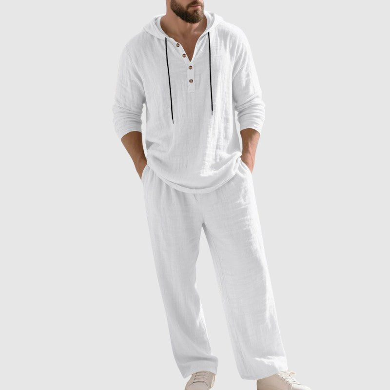 Close-up of men's relaxed-fit hooded two-piece set. Comfort loungewear with henley style top.