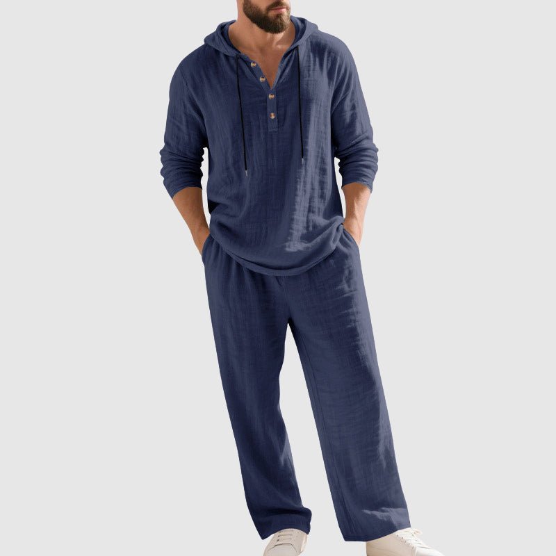 Grey men's casual two-piece set. Hooded top and drawstring pants offer ultimate comfort and relaxed fit.