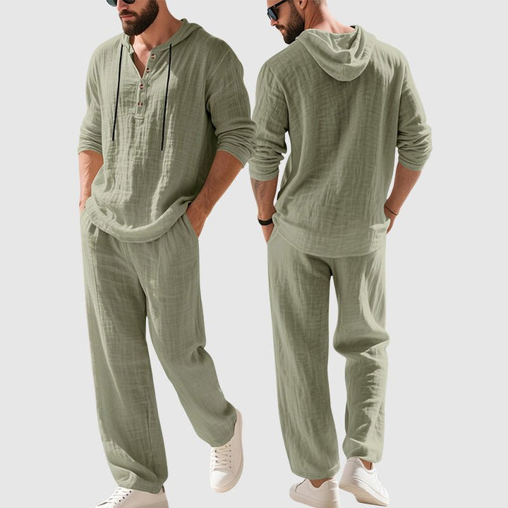 Full shot of men's fashion relaxed-fit hooded two-piece set. Versatile loungewear and summer outfit.