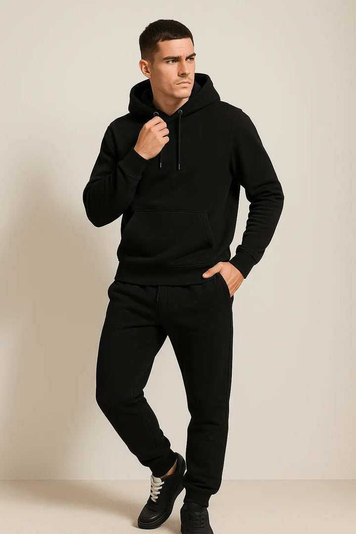 Men's relaxed fit hoodie & jogger tracksuit set. Ideal for casual wear & comfort.
