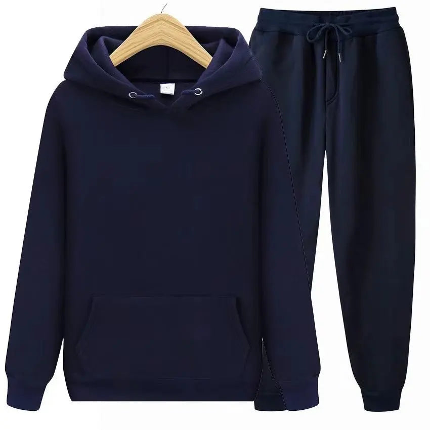 Effortless style: men's relaxed fit hoodie & jogger set, perfect for a casual, modern look.