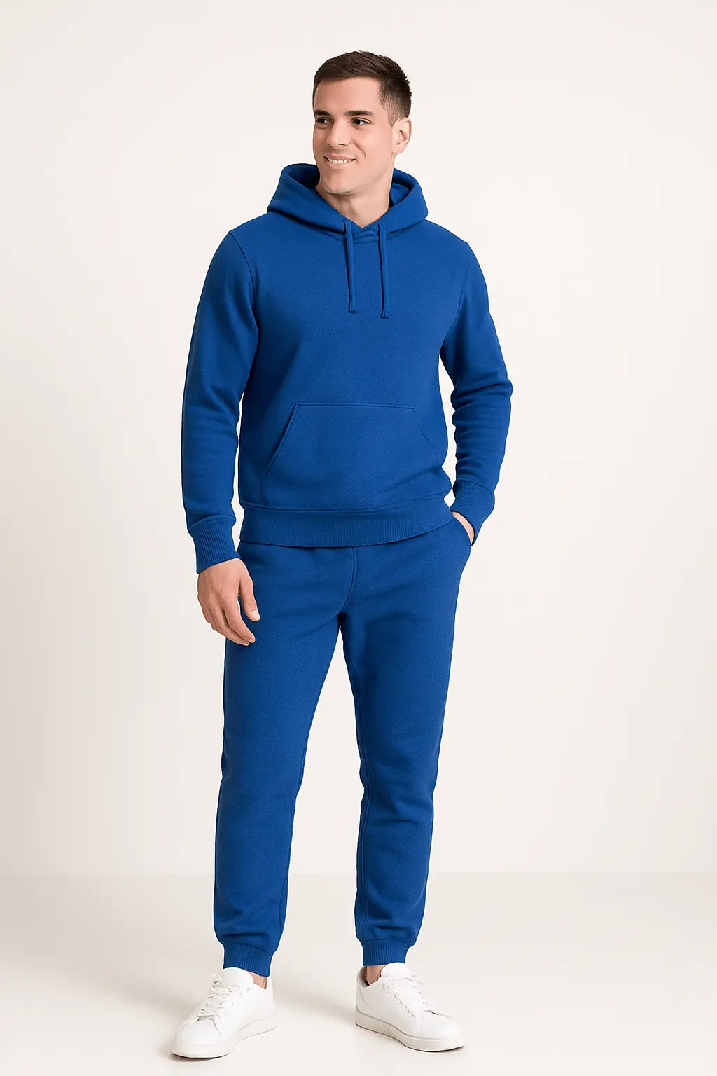 Stylish men's athletic set: relaxed fit hoodie & jogger tracksuit for active lifestyles.