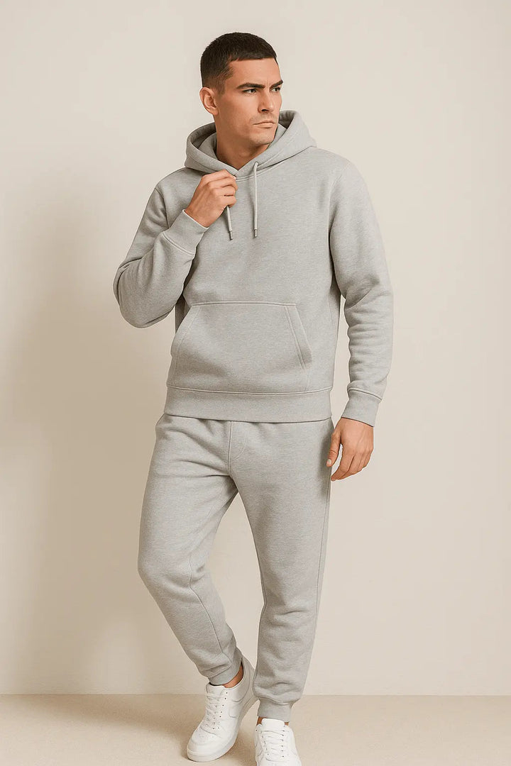 Sporty men's fashion tracksuit with relaxed fit hoodie & joggers, perfect for daily wear.