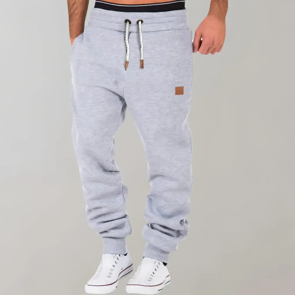 Stylish men's relaxed fit jogger pants, ideal for loungewear or active lifestyles. Comfortable casual bottoms.