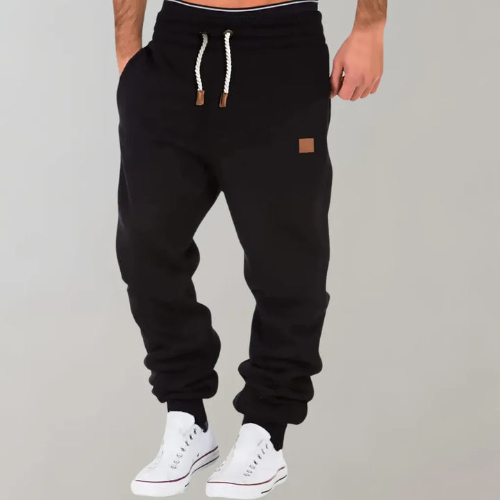 Men's casual relaxed fit jogger pants, perfect as comfy loungewear or stylish activewear bottoms.
