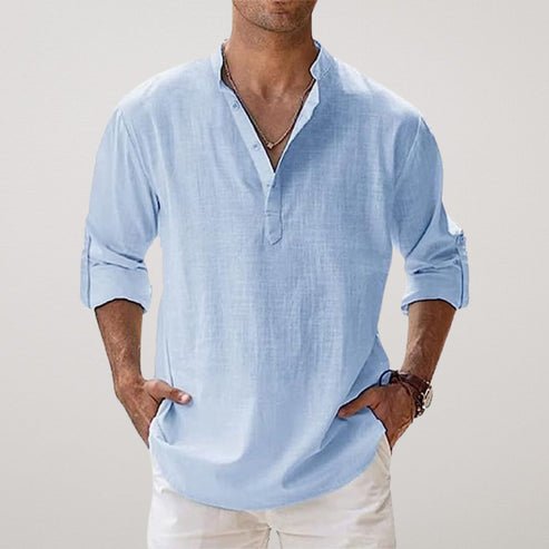 Breathable men's linen shirt, relaxed fit, rolled sleeves. Ideal for warm weather, versatile day-to-evening style.