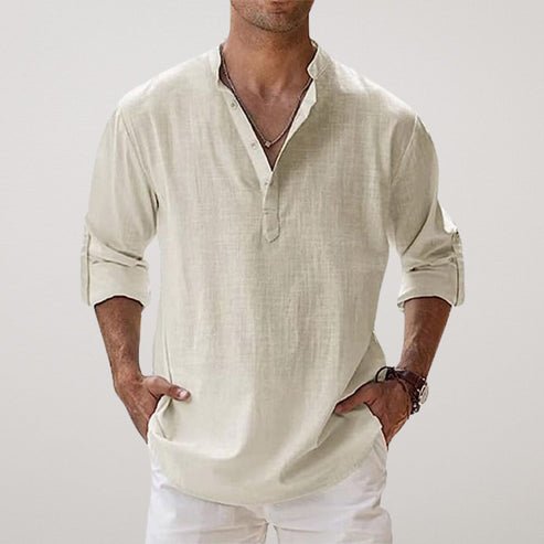 Men's light linen shirt with rolled sleeves, relaxed fit. Essential breathable top for holiday or everyday summer style.