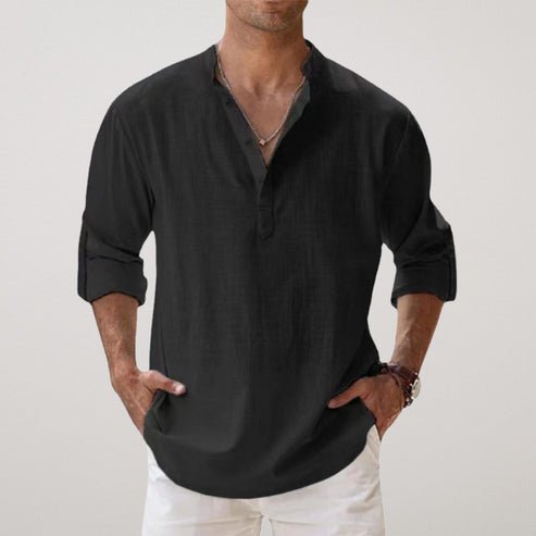 Effortless men's relaxed-fit linen shirt with rolled sleeves. Perfect for comfortable summer and holiday fashion.
