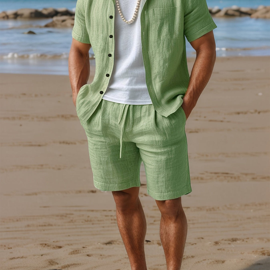 Casual men's summer outfit: comfortable linen short sleeve shirt & matching shorts for beach & vacation.