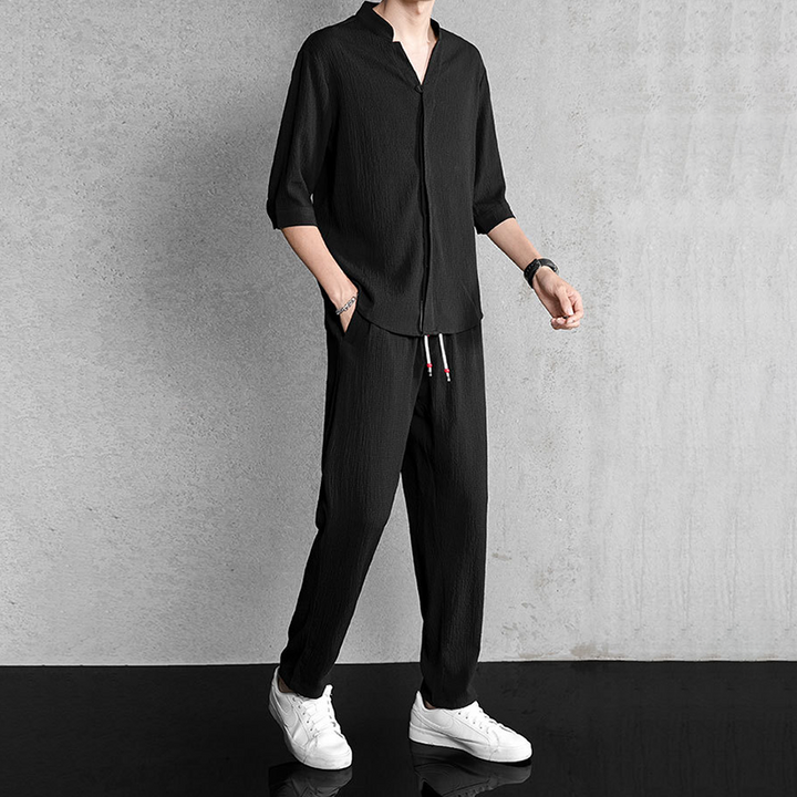 Breathable men's linen two-piece set, V-neck top & pants. Perfect casual summer outfit for men.