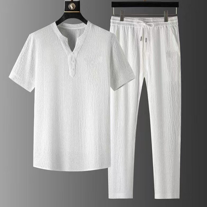Men's V-neck linen two-piece set, perfect for a relaxed summer vacation or comfortable weekend activities.