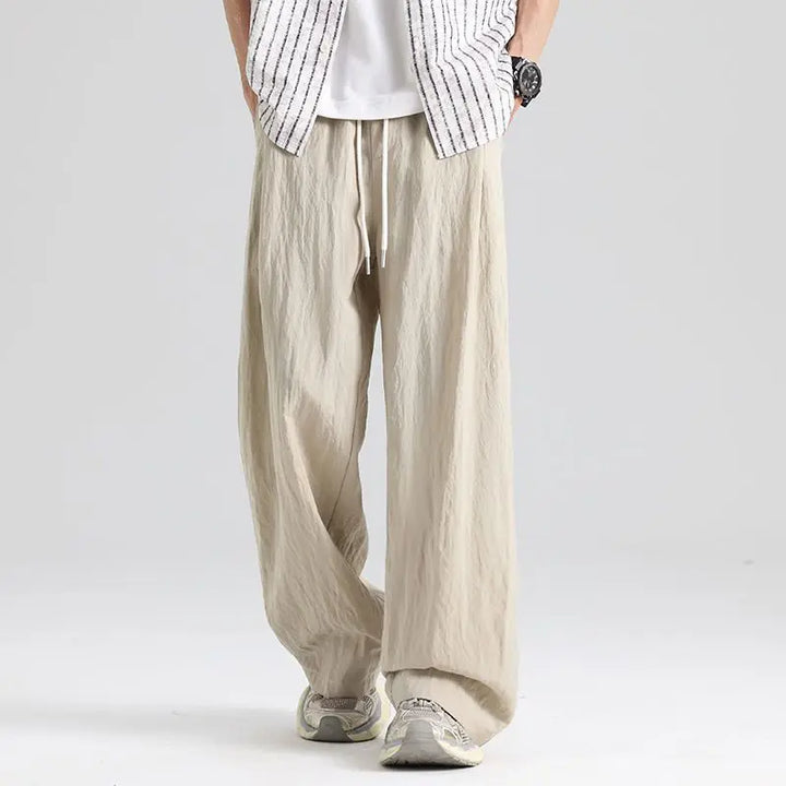 Stylish men's relaxed fit linen trousers, versatile for casual, smart casual, or comfortable summer wear.