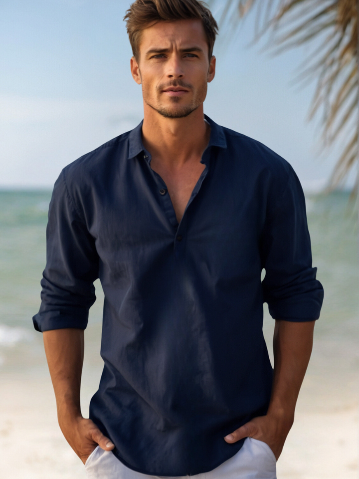 Casual men's relaxed fit long sleeve button-down resort shirt, perfect for summer fashion.