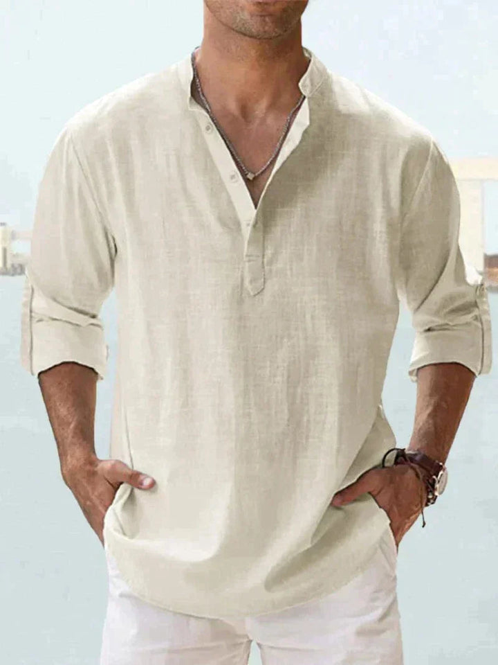 Stylish men's long sleeve resort shirt, relaxed fit, lightweight fabric, great for summer vacation.