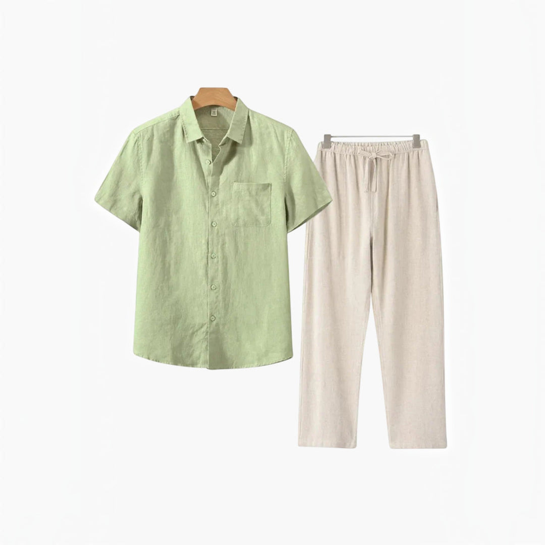Stylish men's two-piece relaxed fit set: matching shirt & shorts for vacation style.