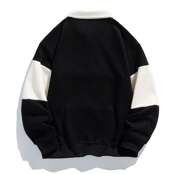 Man wearing a relaxed fit polo sweatshirt with button placket, comfortable & stylish.