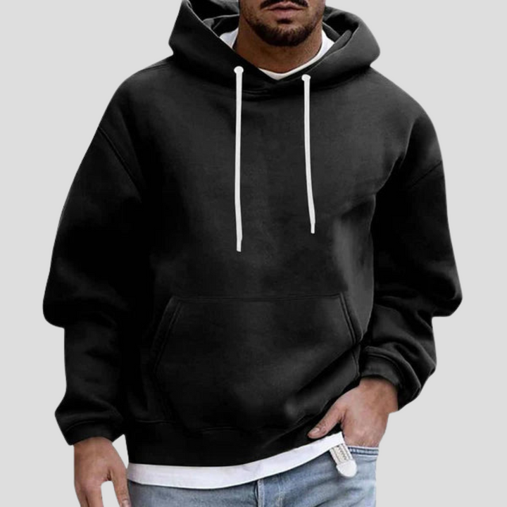 Versatile men's relaxed fit hoodie with kangaroo pockets, ideal for activewear, casual outings, and cozy loungewear.