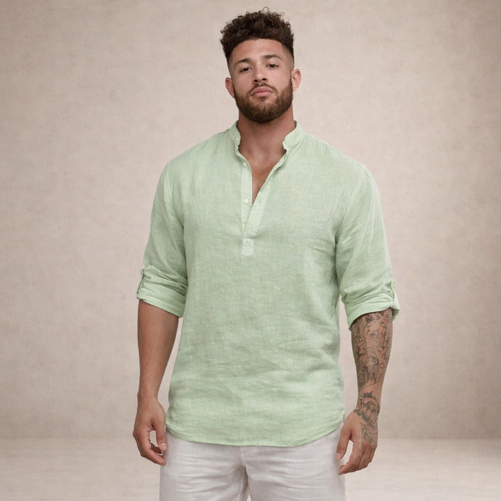 Men's casual resort wear shirt with open placket, roll sleeves. Stylish top for summer vacation.