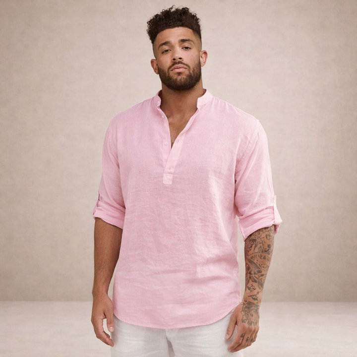 Men's relaxed resort shirt with open placket, roll sleeves; a stylish top for summer travel.