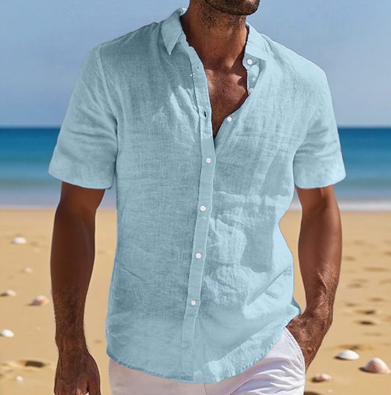 Men's relaxed fit short sleeve button-down shirt, perfect for casual summer wear & holidays.