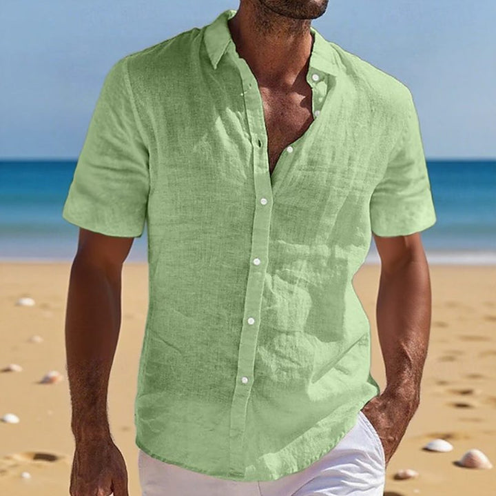 Versatile men's short sleeve casual shirt with relaxed fit, great for summer style & comfort.