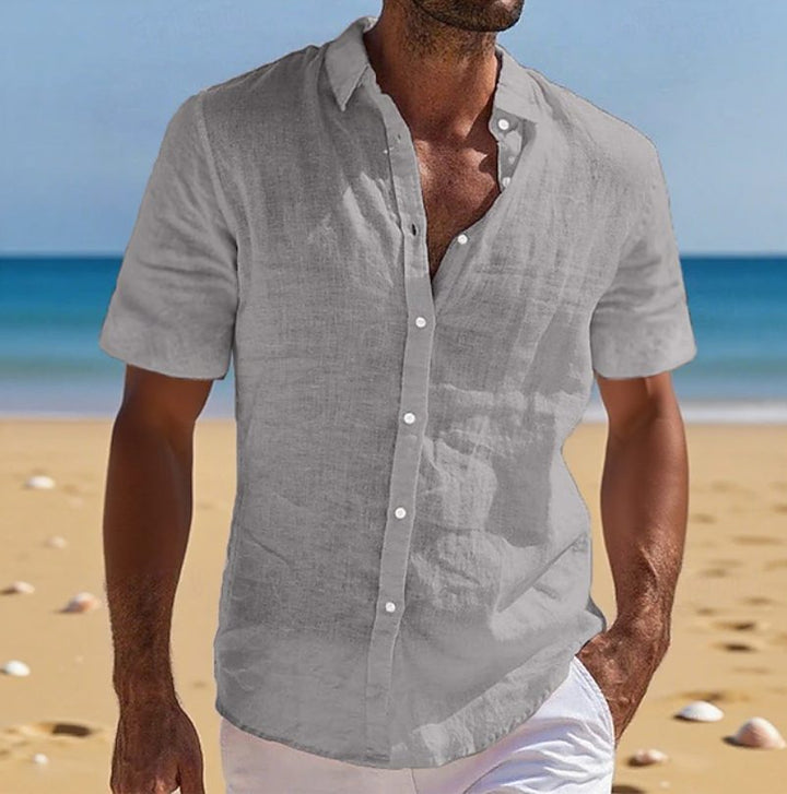 Holiday-ready men's relaxed fit short sleeve shirt, a casual & breathable button-down for summer.