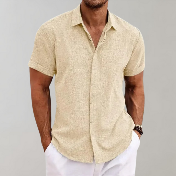 Men's relaxed fit short sleeve button-up casual shirt. Ideal for summer & everyday wear.