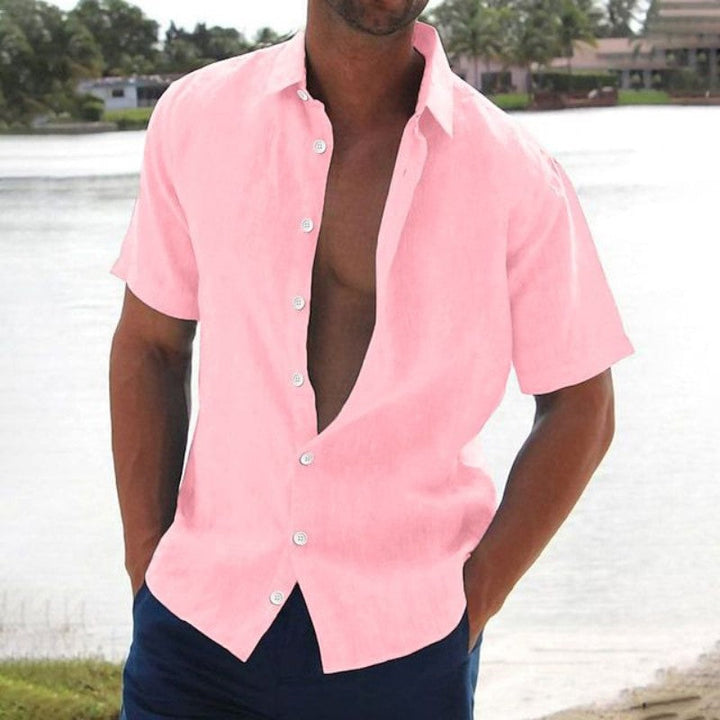 Men's relaxed fit short sleeve button-up summer shirt. Ideal for casual, vacation, and warm weather wear.