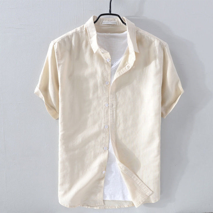 Stylish men's short sleeve button-down shirt, offering a relaxed fit for summer fashion.