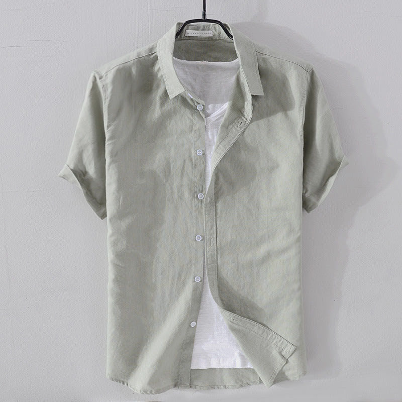 Versatile men's casual shirt with a relaxed fit and short sleeves, suitable for any occasion.