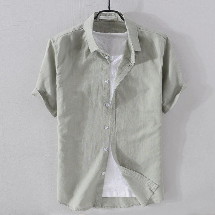 Versatile men's casual shirt with a relaxed fit and short sleeves, suitable for any occasion.