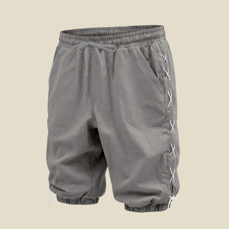 Versatile men's relaxed fit shorts. Lace-up sides, drawstring, and knee-length for stylish casual summer apparel.