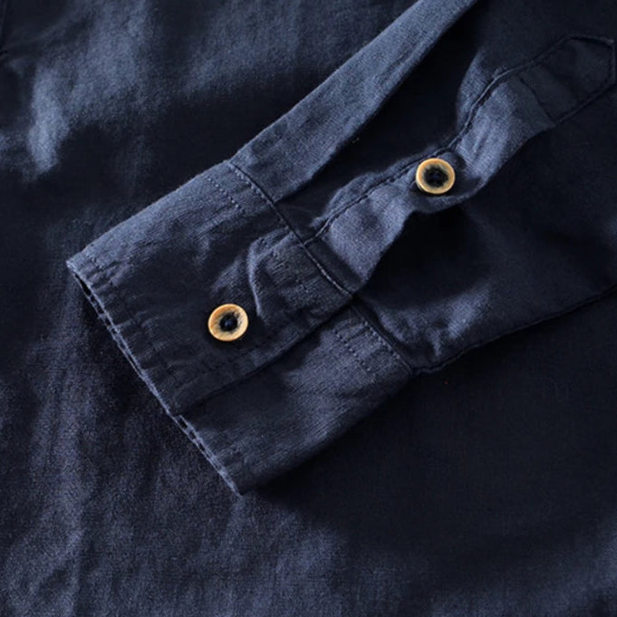 Navy men's summer shirt, relaxed fit, stand collar, half button design. Versatile for smart casual outfits.
