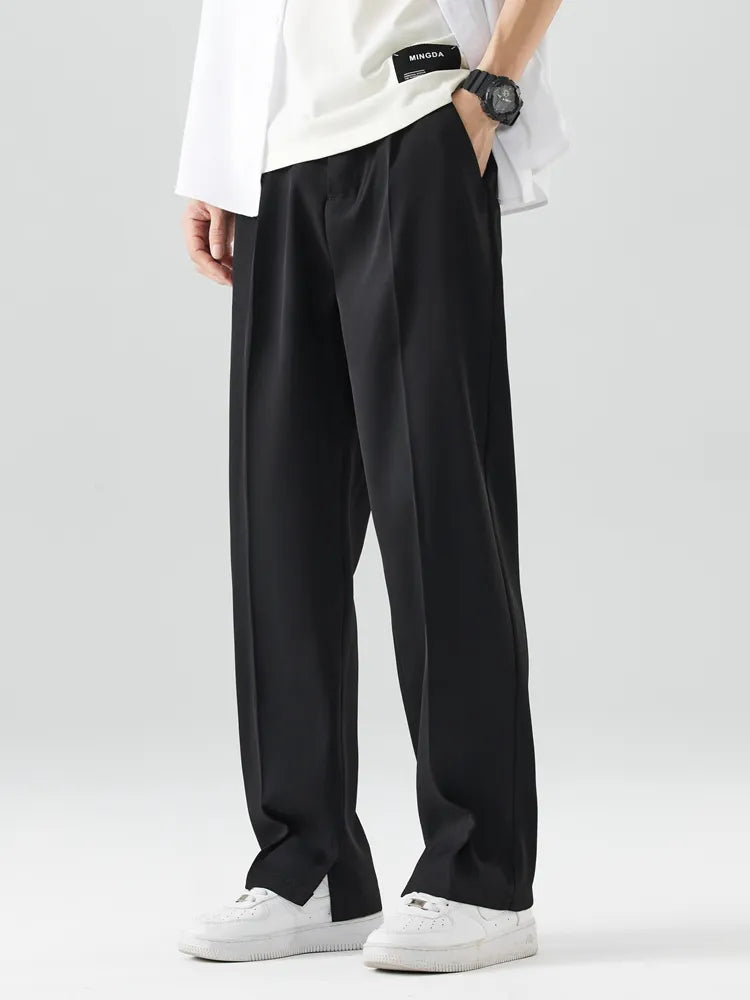 Full view of men's relaxed fit straight leg trousers. Comfortable, breathable chinos for versatile everyday wear.