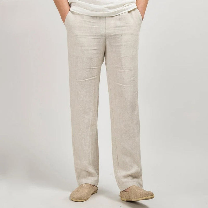 Men's relaxed fit straight leg linen trousers in a light color, ideal for comfortable summer casual wear.