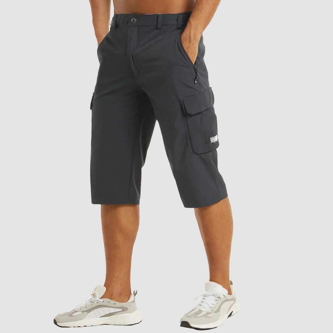 Durable men's utility shorts: relaxed fit stretch cargo bermudas. Ideal outdoor and casual summer shorts for men.
